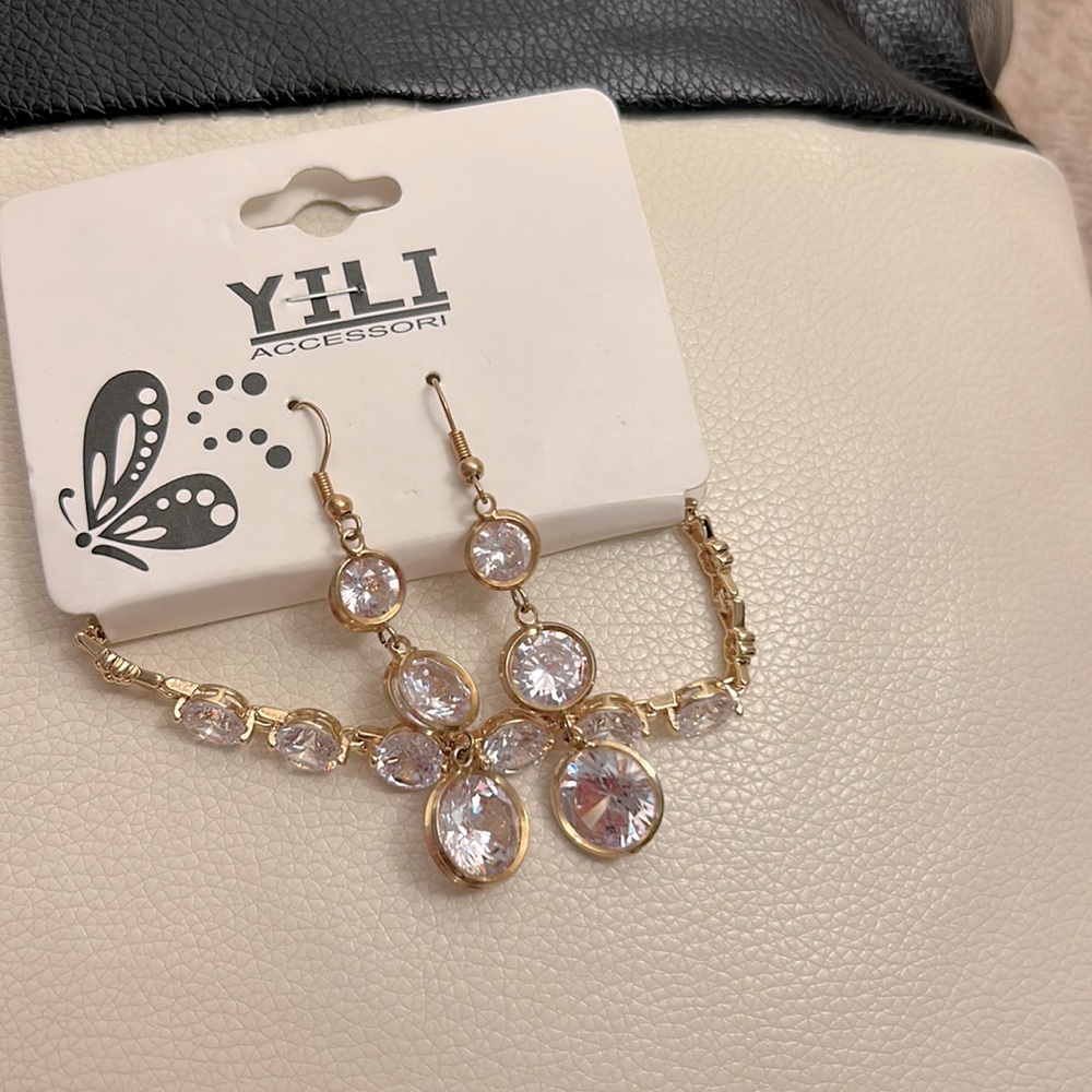 Costume jewelry- brand new- earring and bracelet. Nickel free